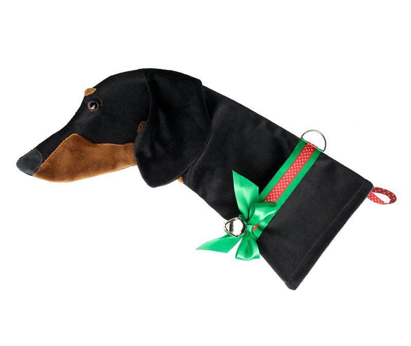 This Black and Tan Dachshund dog Christmas stocking is perfect for stuffing toys and treats into to spoil your fur baby for Christmas, or whatever holiday you celebrate!