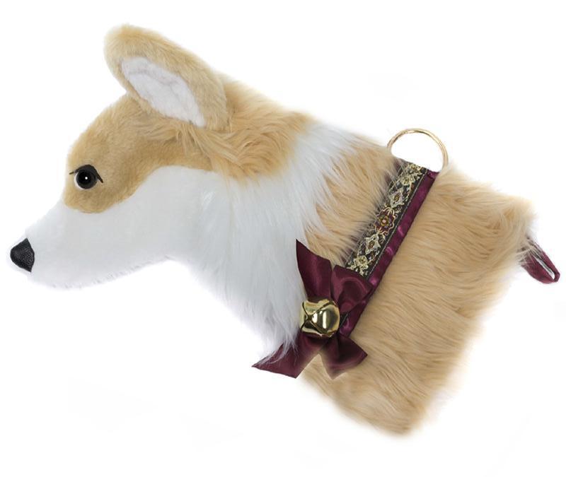 This Corgi dog Christmas stocking is the perfect gift for stuffing toys and treats into to spoil your fur baby for Christmas, or whatever holiday you celebrate!